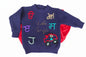 Children's sweater with colorful letters and a car design on a mannequin.